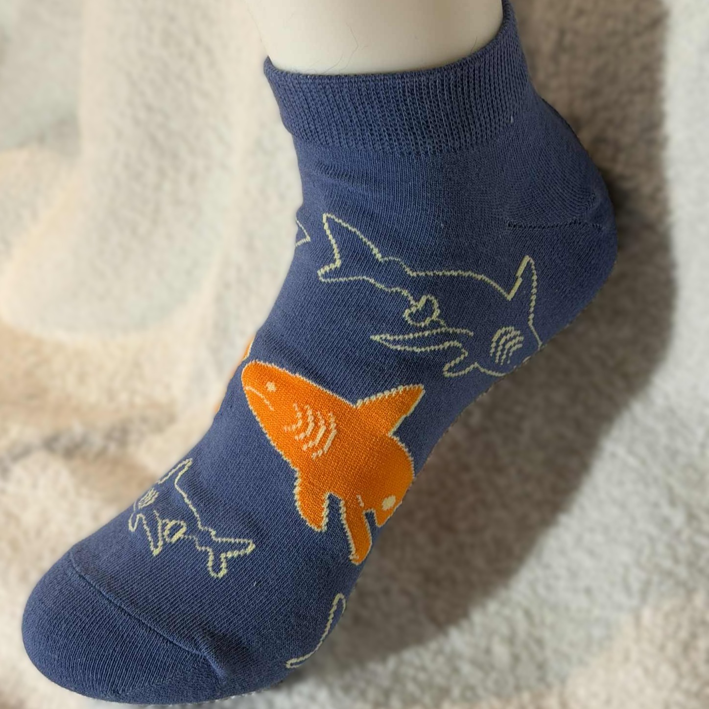 Ankelsokk med Haier som svømmer