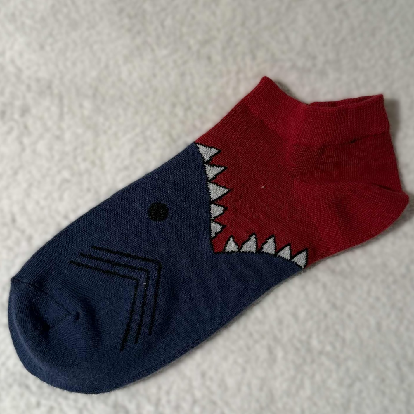 Ankelsokk med Hai som spiser fot